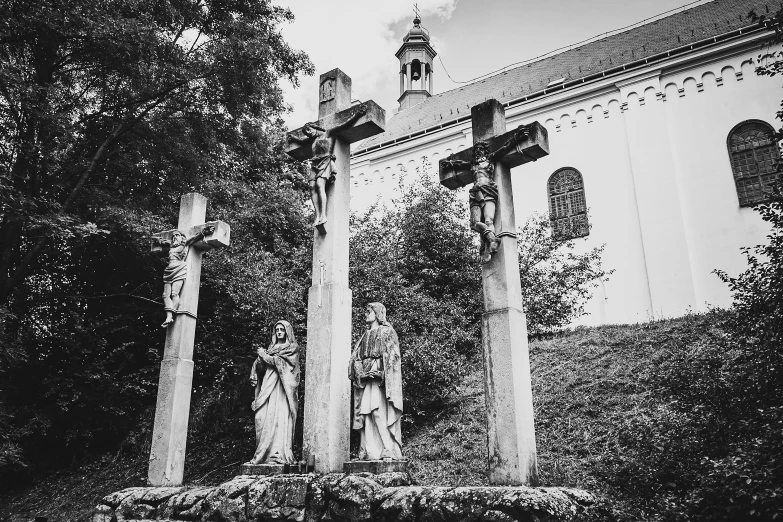 several statues of people in an old building