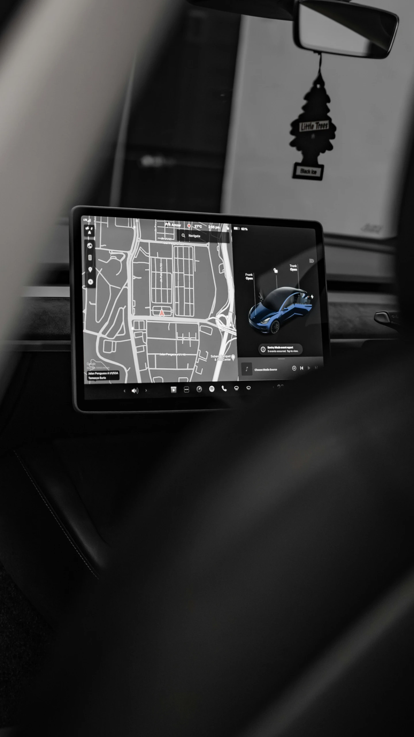 the dashboard is shown with a gps in the car