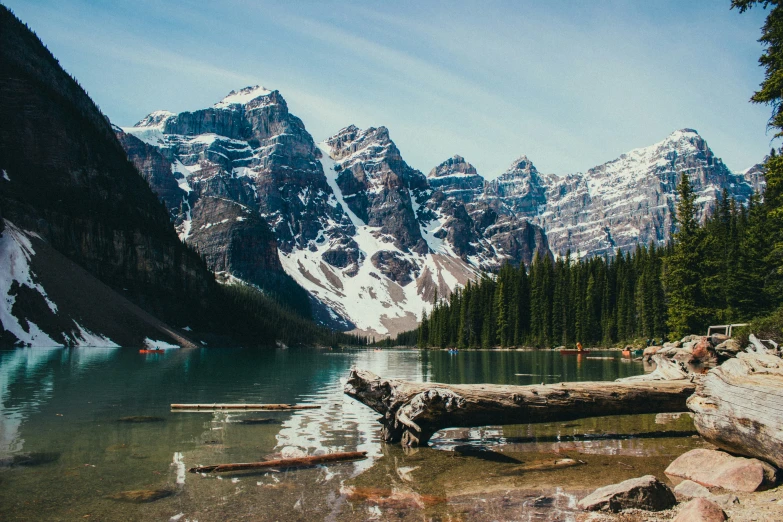 a view of some mountains near the water