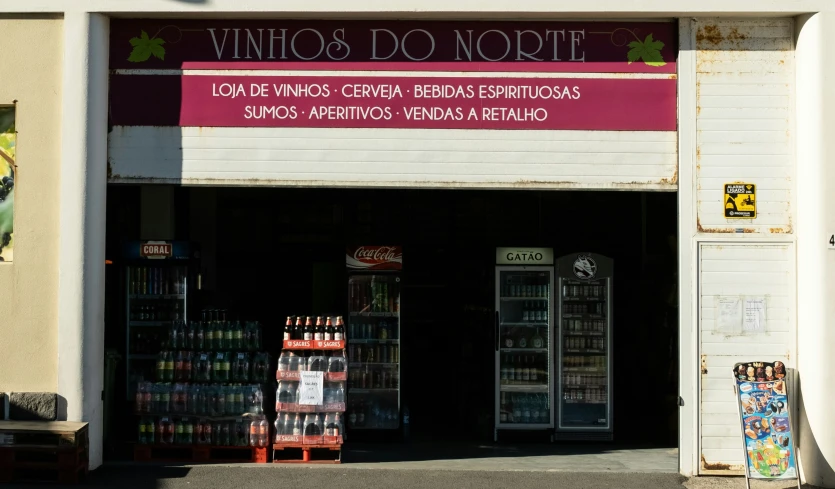 there is a store front with different drinks on display