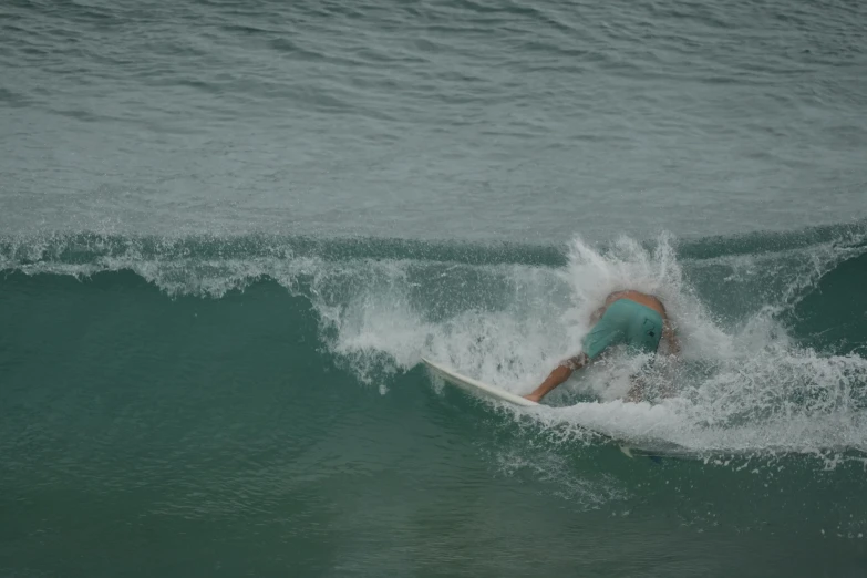 a surfer is riding the waves in the ocean