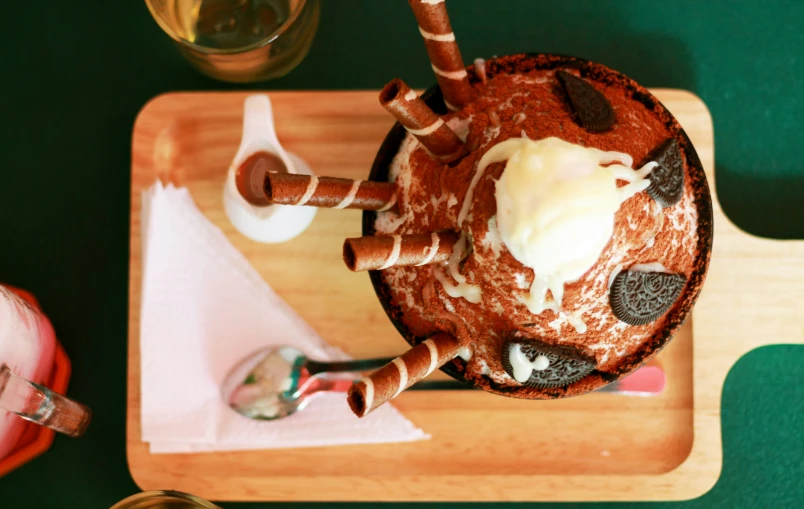 an overhead view of a chocolate cake with marshmallow topping