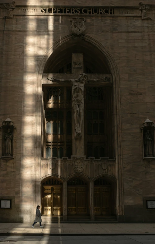 two people crossing the street in front of a building