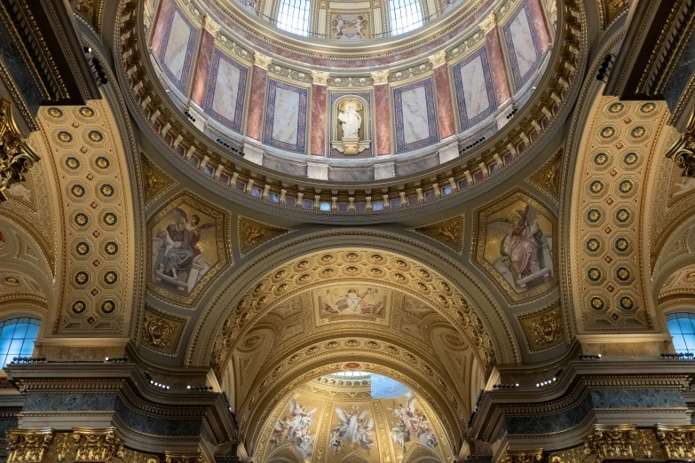 the ceiling and domed structure in a cathedral