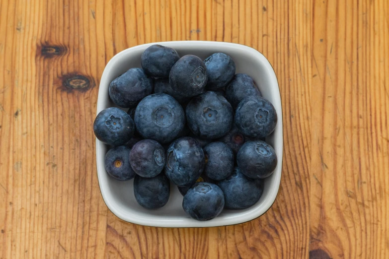 some fruit that is sitting in a bowl