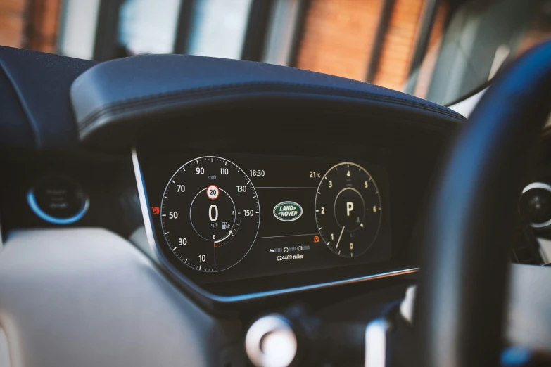 dashboard of an automobile with the time displayed