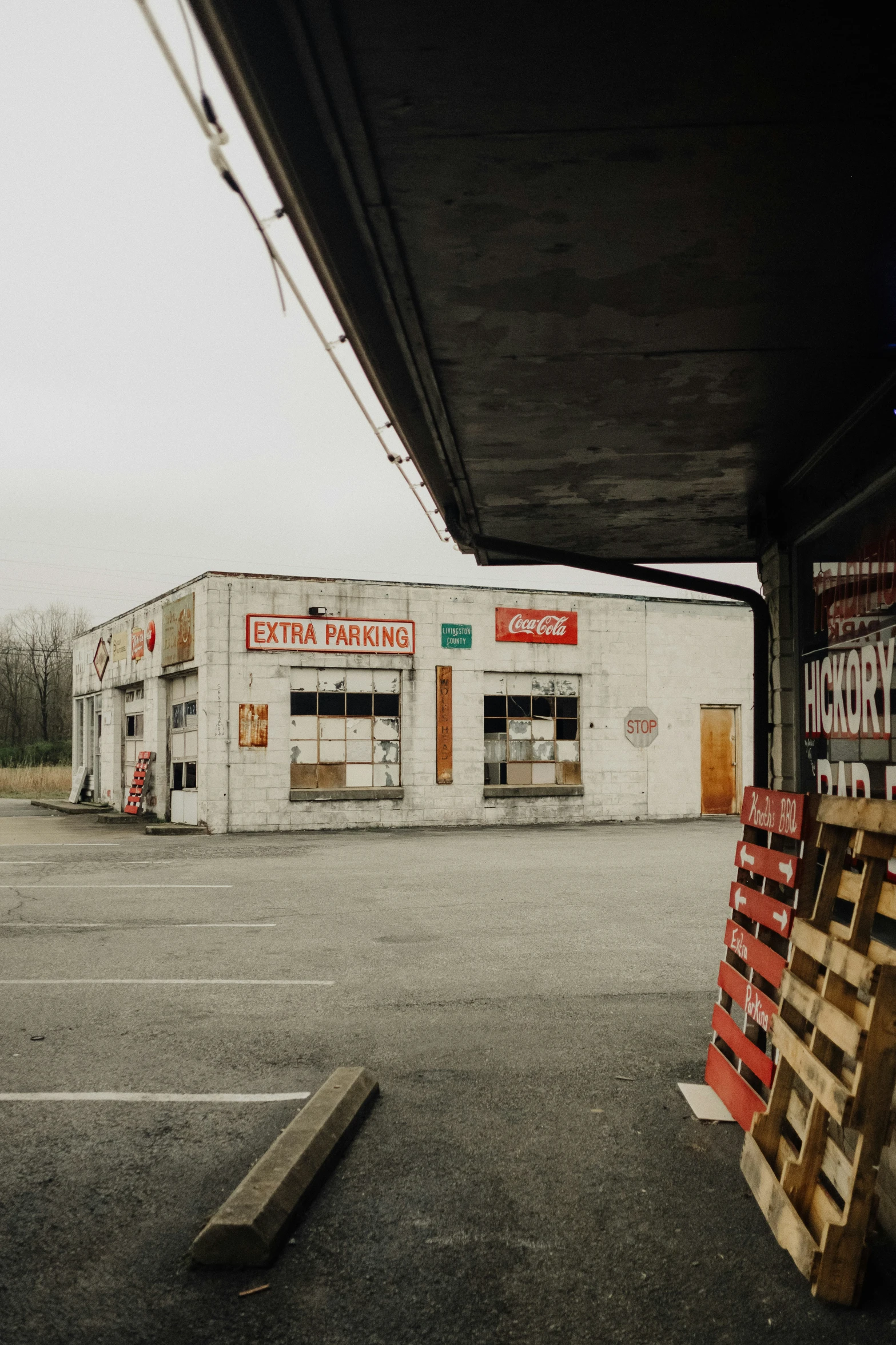 the empty store sits alone at the empty intersection