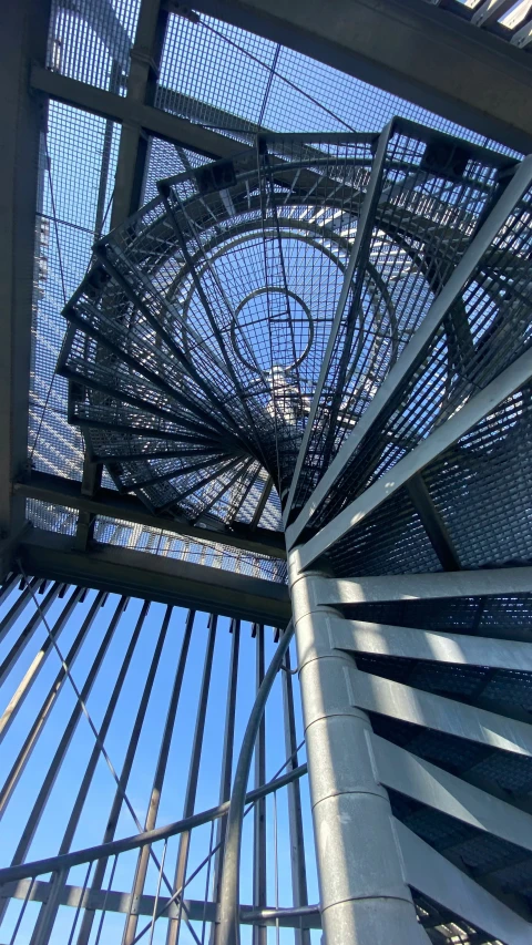 the structure is very tall and has metal bars