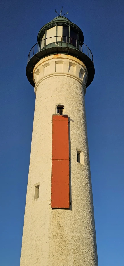 the top of a very tall white light house