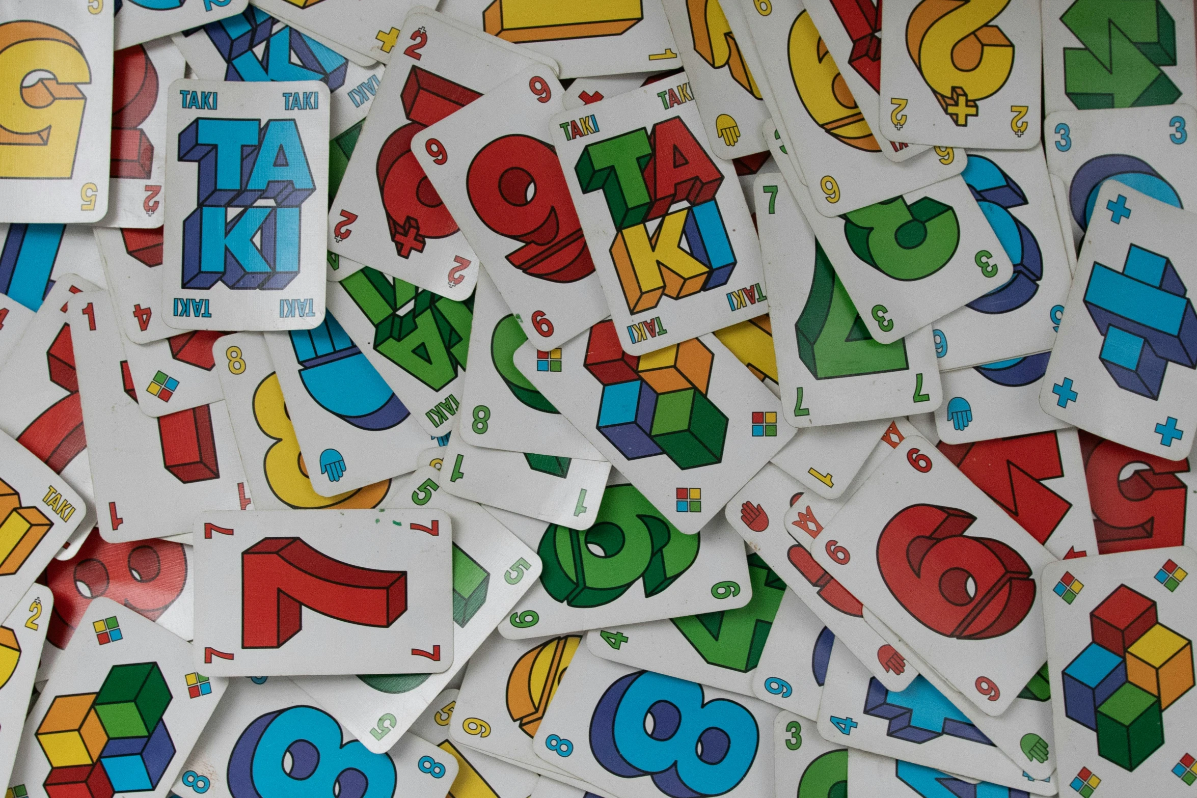 a pile of colorful printable letter and numbers are scattered together