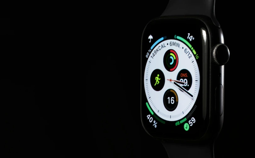 an apple watch with the time displayed on it's display screen