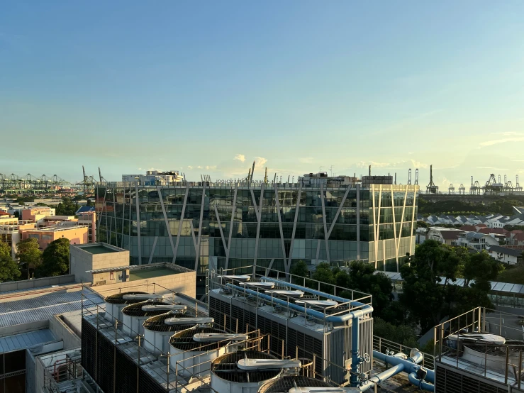 the city of a factory building with various industrial buildings in the background