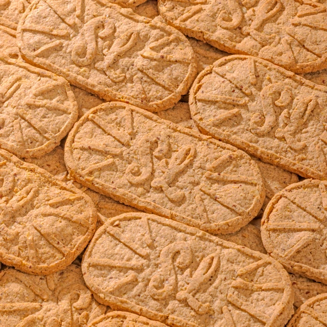 a display case for cookies covered in powdered sugar