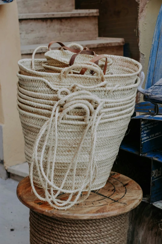 several different types of bags sitting together in a basket