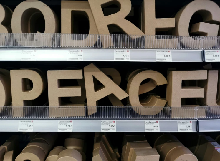 cardboard type words sitting on top of each other