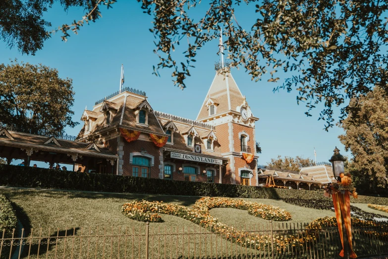 a castle style building with clocks in the middle